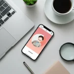 A smartphone on a desk used to check Pinterest username availability